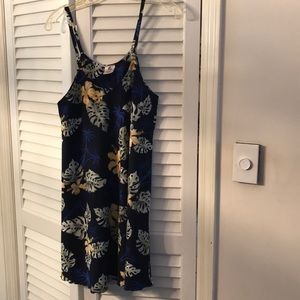 Rima Beachwear dress with bright leaves.